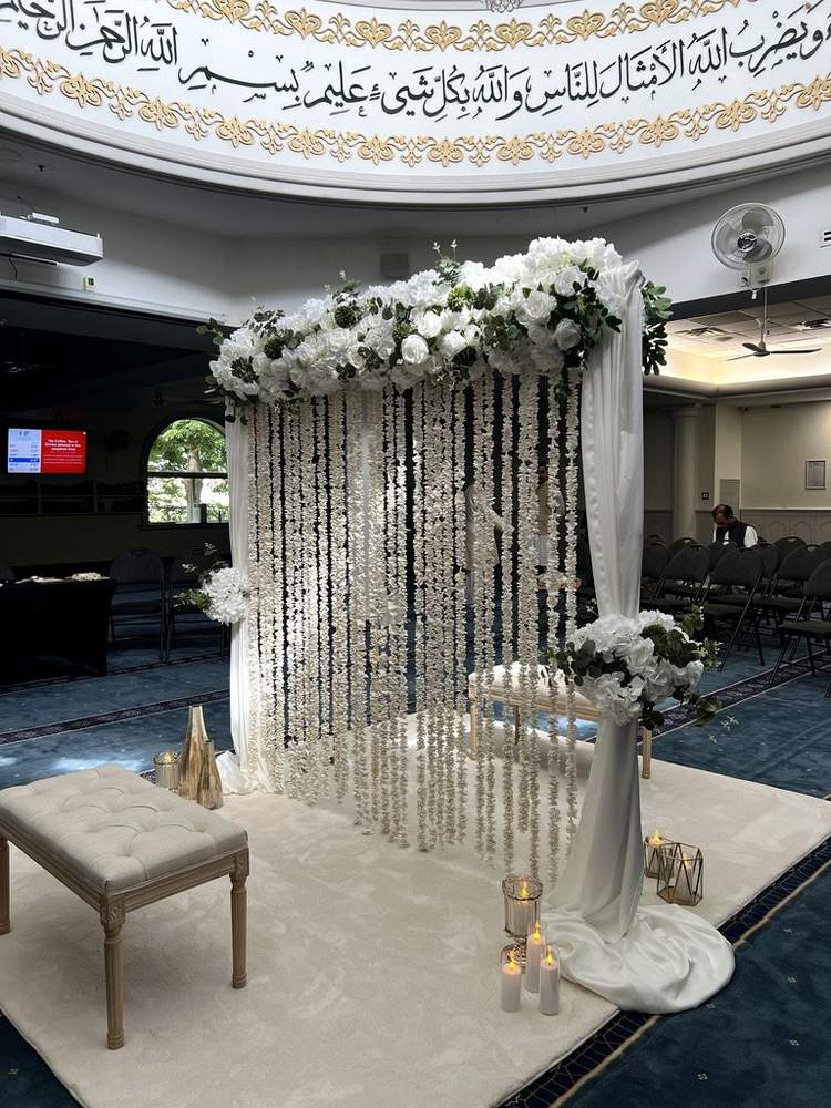 Classic white floral Nikkah divider with bench seating and area rug